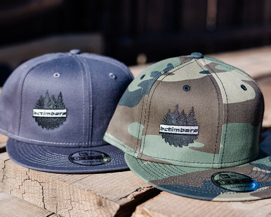 Flatbilled BCTIMBERS Hats. Comes in Dark Grey, Green Camo & Black. One Size Fits Most.